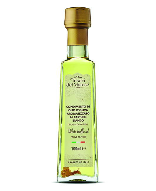 High quality white truffle oil based on selected olive oils and precious slices of white truffle High quality white truffle oil based on selected olive oils and precious slices of white truffle